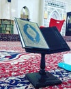 A beautiful angle photograph of a QurÃ¢â¬â¢an inside a mosque